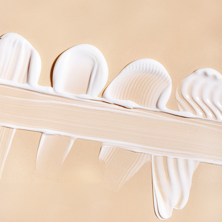 Creamy textures on a beige background